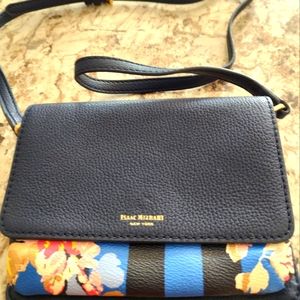 An Issac Mizrahi leather handbag.